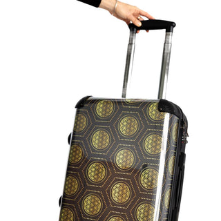 Front view of a woman holding the extension handle of the RUBY8WEAVER Sweet Life Spinner Carry-On Suitcase with glossy front