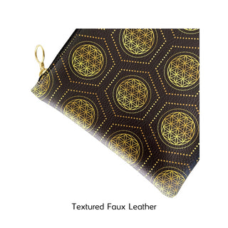 RUBY8WEAVER® "Sweet Life" Sacred Geometry design on a textured faux leather clutch showing leather and round gold zipper pull detail